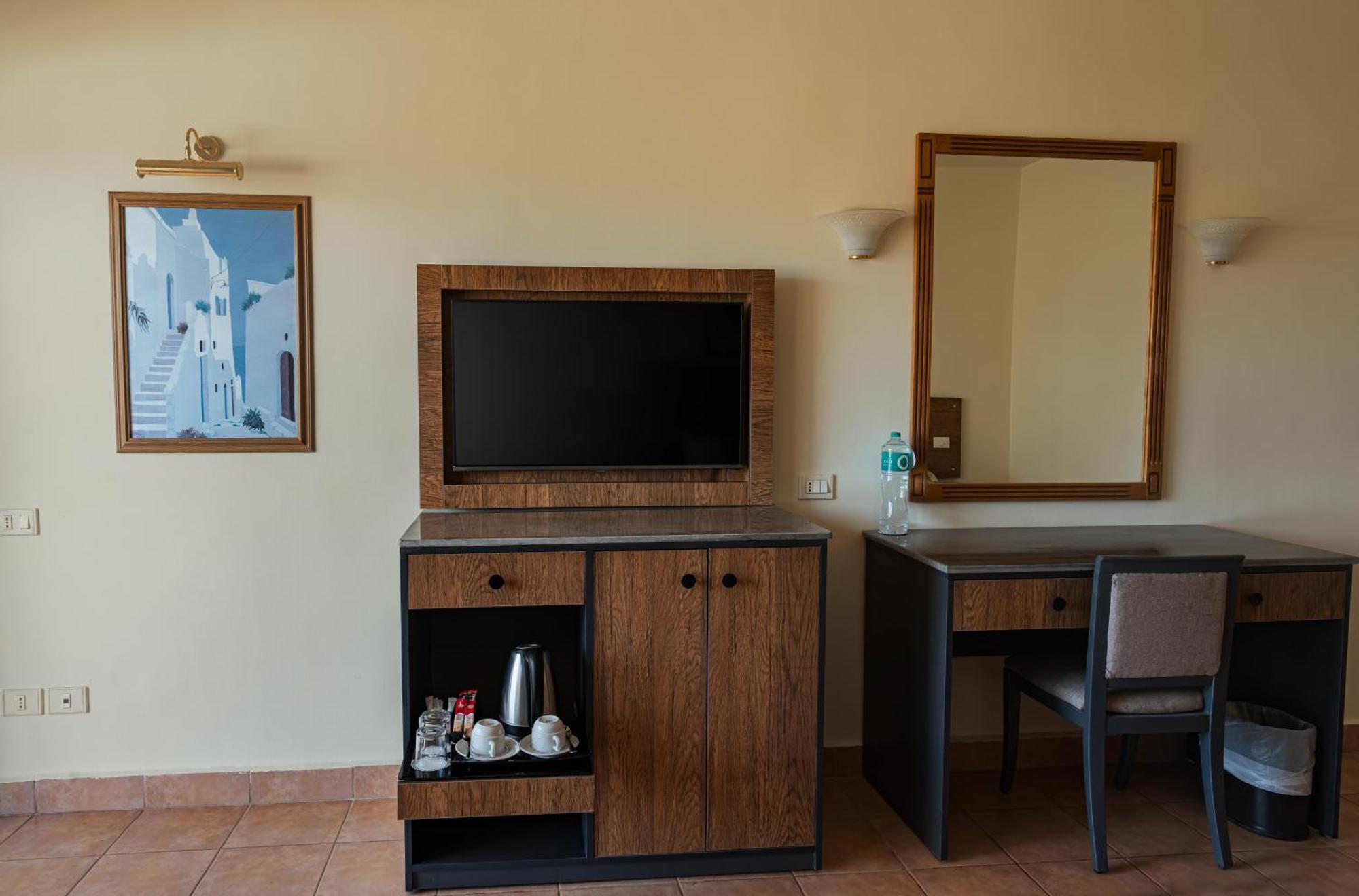 Hurghada Long Beach Resort Esterno foto A television in a hotel room